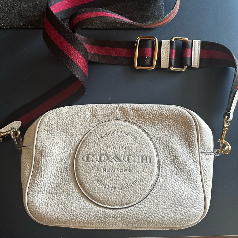Coach pebble leather crossover cream color bag